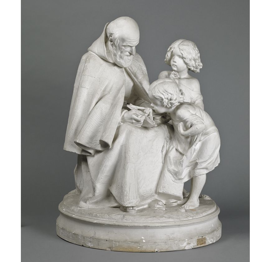 Un Capucin avec des enfants communément appelé Saint Vincent de Paul